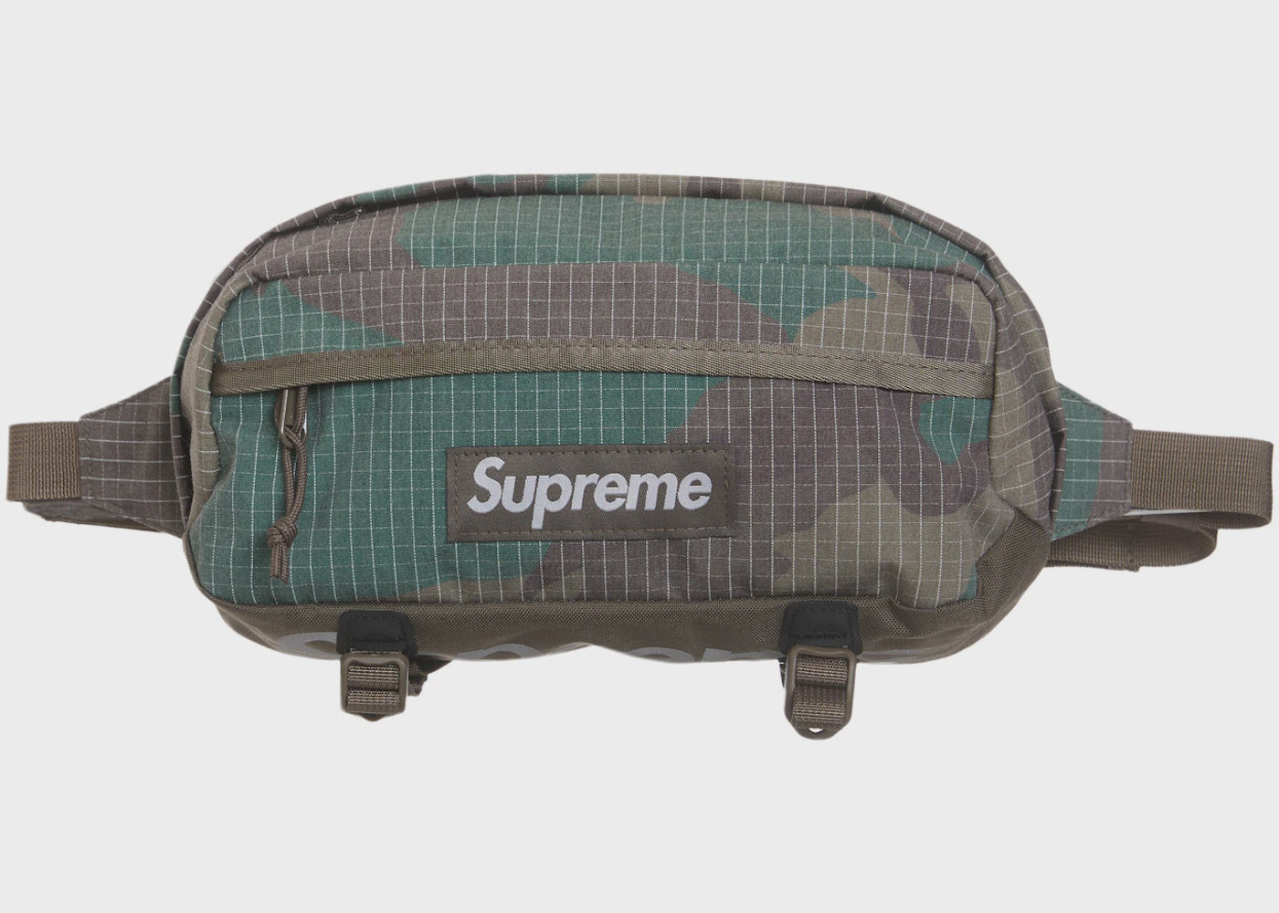 Supreme Waist Bag in Woodland Camo (SS24) featuring adjustable strap and multiple compartments for convenient storage and organization