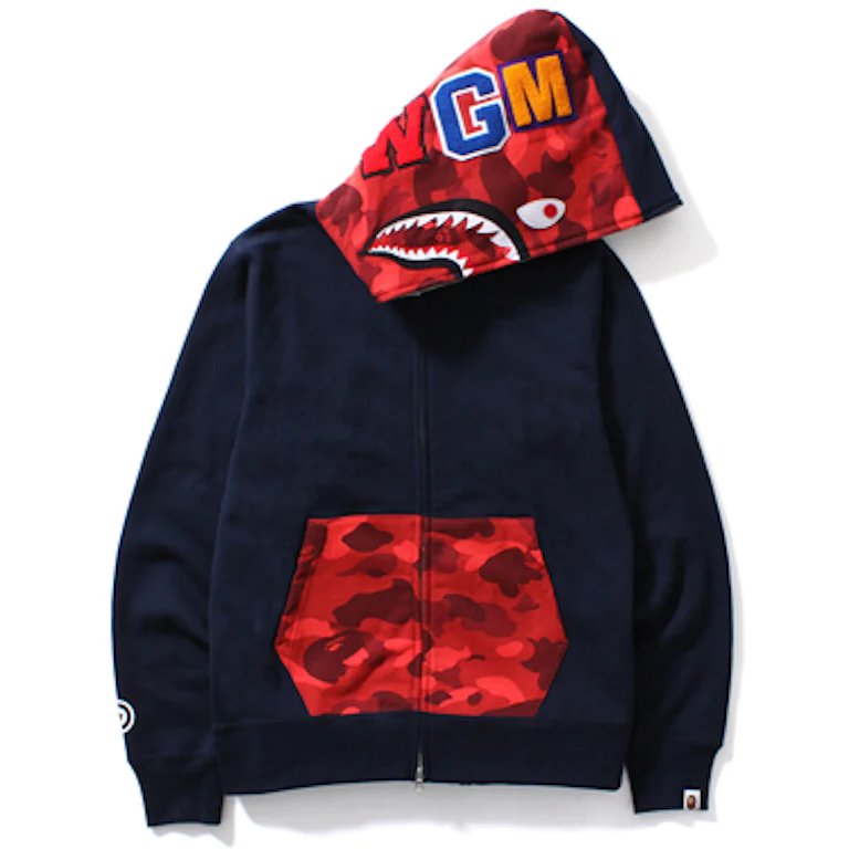 A close-up image of the BAPE Color Camo Shark Full Zip Hoodie in navy/red, showcasing the iconic shark face design and vibrant color pattern