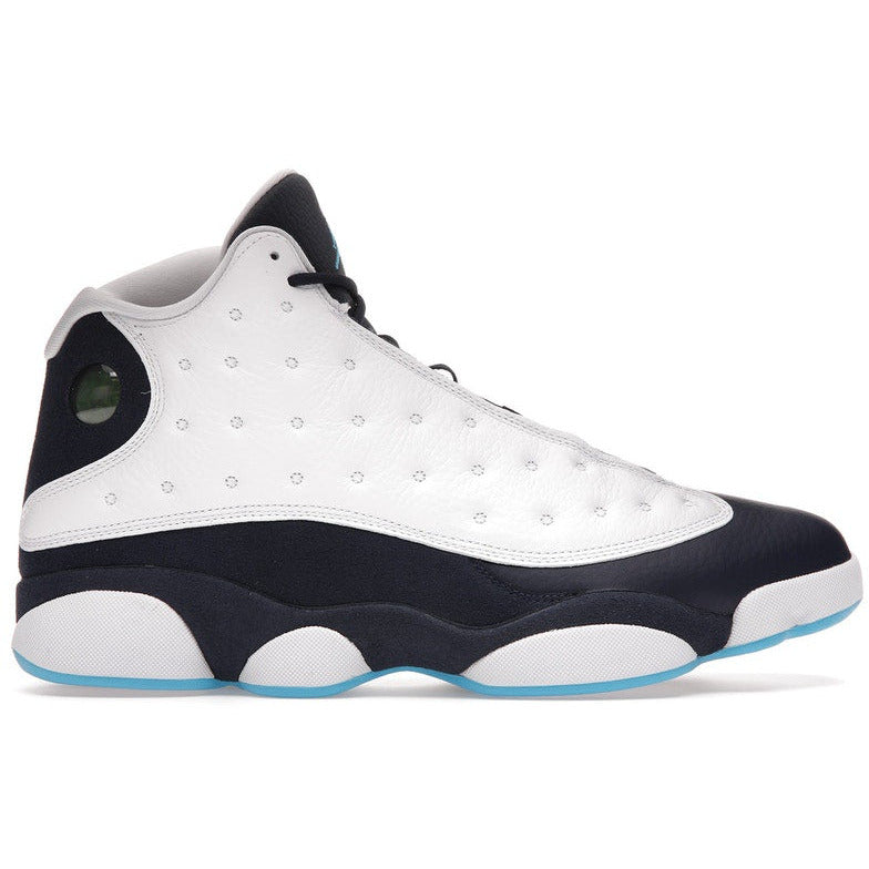 Close up image of the Jordan 13 Retro sneakers in Obsidian Powder Blue White colorway, featuring a sleek design and iconic Jumpman logo