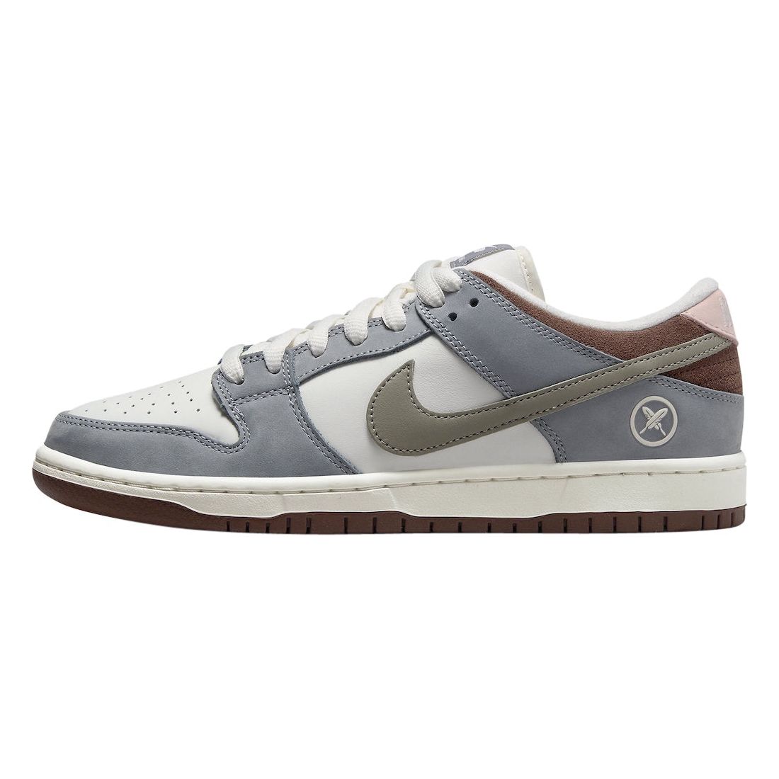 Nike SB Dunk Low - Yuto Horigome (FQ1180-001) showcasing black and silver colorway, with signature details and durable construction for skateboarding
